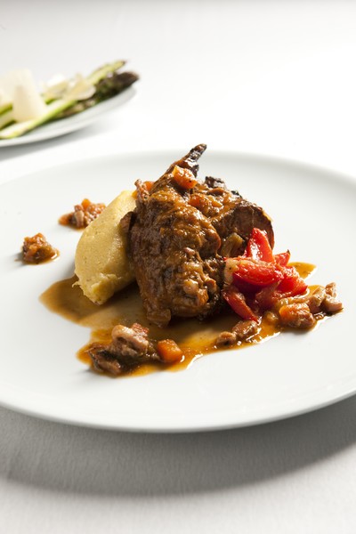 Rabbit slowly braised in Arneis white wine and served on soft polenta with peperonata